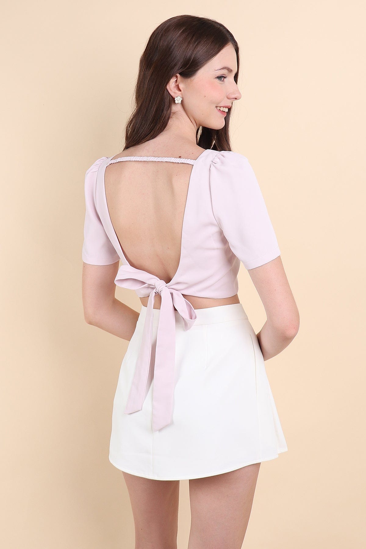 BEBE PADDED BOW OPEN BACK TOP IN PINK