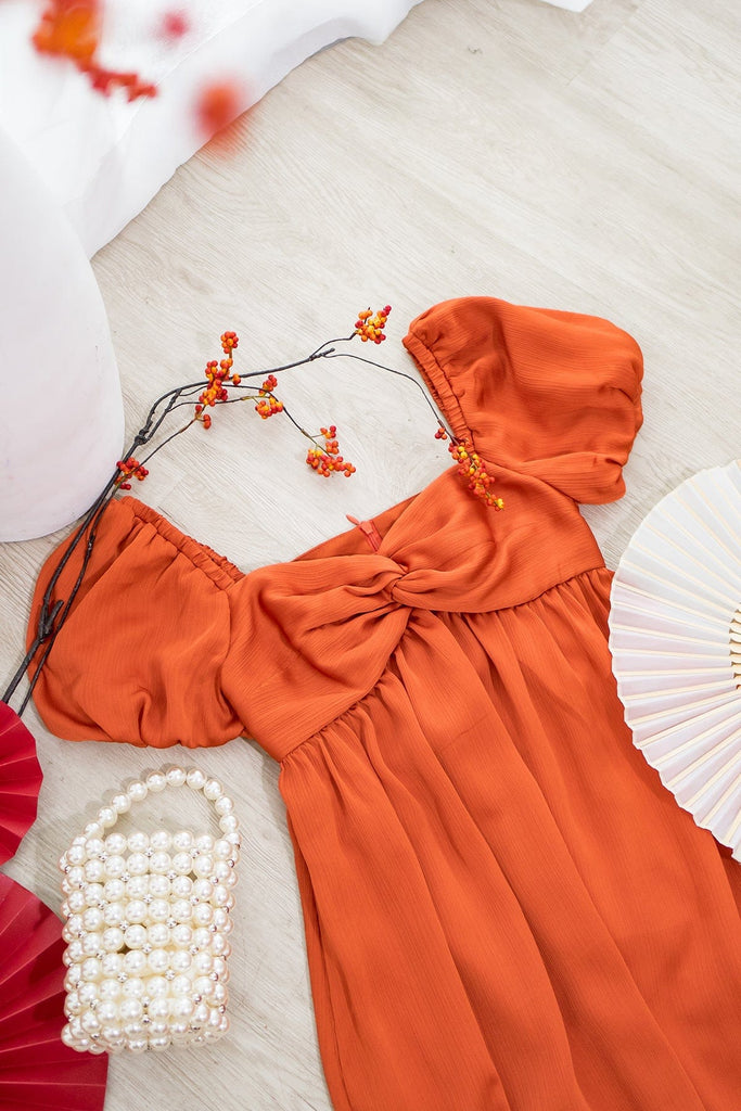 VALENTINA PUFF SLEEVE EMPIRE DRESS IN ORANGE VALENTINA PUFF SLEEVE EMPIRE DRESS IN ORANGE